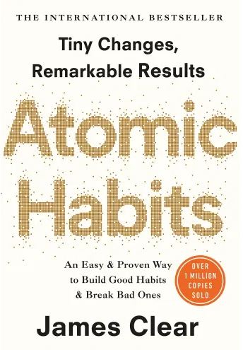 Atomic Habits. Tiny Changes Remarkable Results - Over Time. We live in a delayed return environment yet we are hardwired for instant gratification. Photo of the book cover.