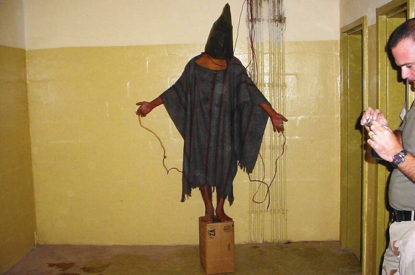 The Lucifer Effect. Understanding How Good People Do Bad Things. How Persons Of Direct Influence Can Appeal To The Better Angels Of Our Nature. Photo of a tortured hooded prisoner.