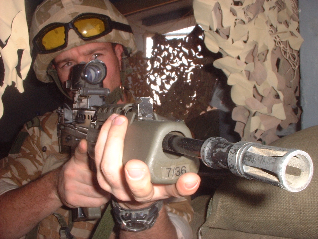 Focused Mind [Zanshin] is a mindset of relaxed alertness that is completely focused on action and fixated on the task at hand. It is an effortless vigilance. Photo of a soldier with a sniper rifle.